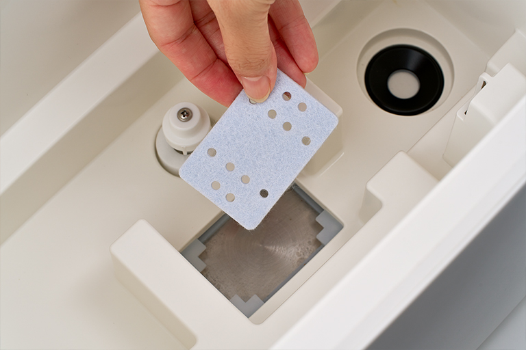 使い捨てタイプのスケール吸着パッド